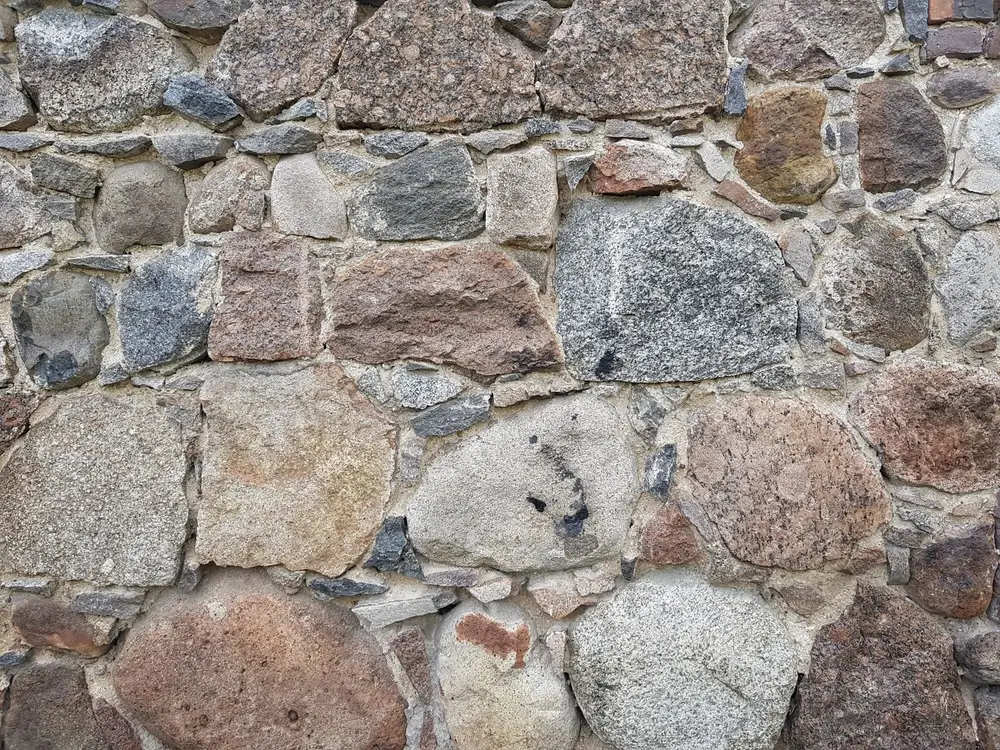 Mur de clôture en pierre (photo d'illustration)